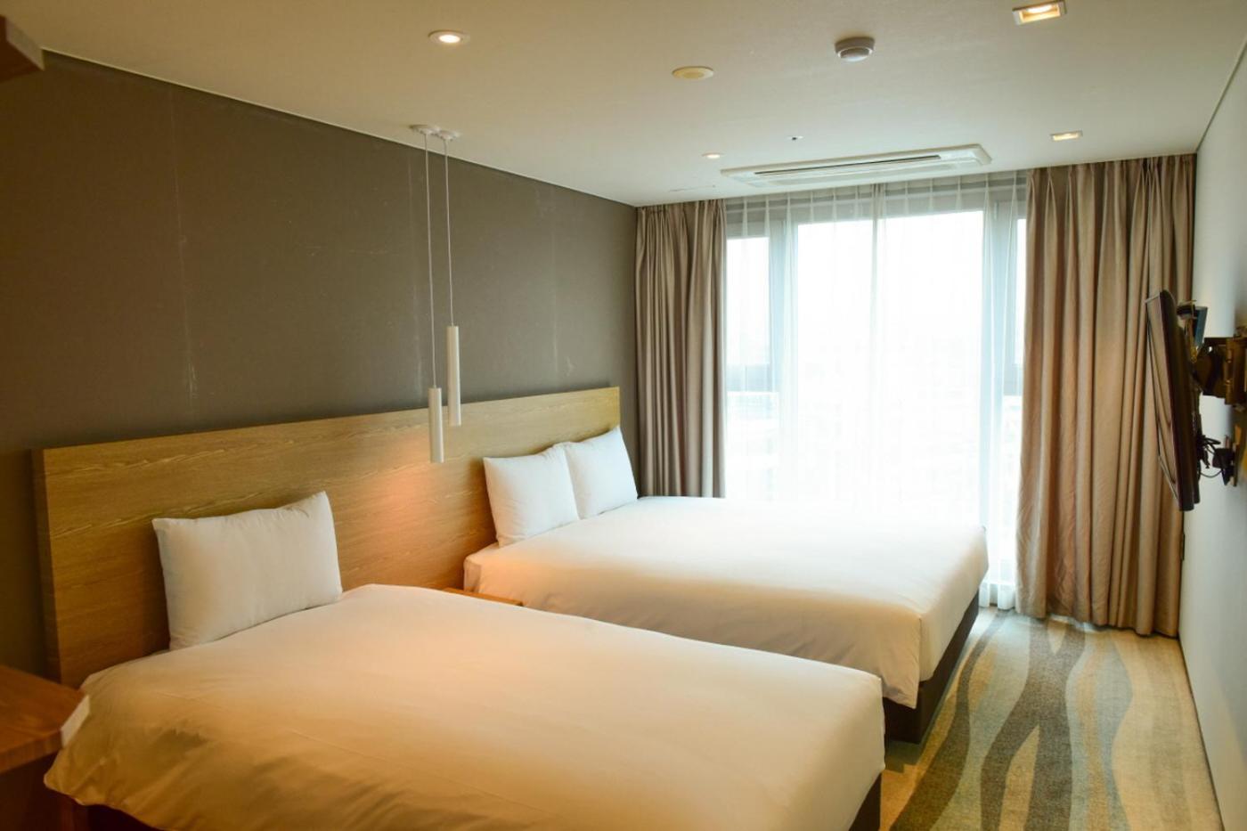 Saint Beach Hotel Чеджудо Экстерьер фото